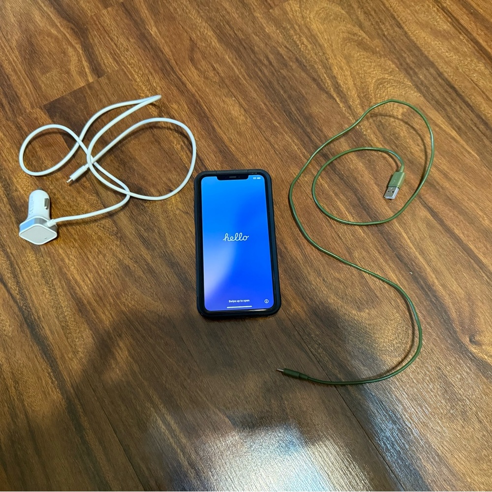 iPhone 11 Pro Max with black otterbox and cords (READ DESCRIPTION)